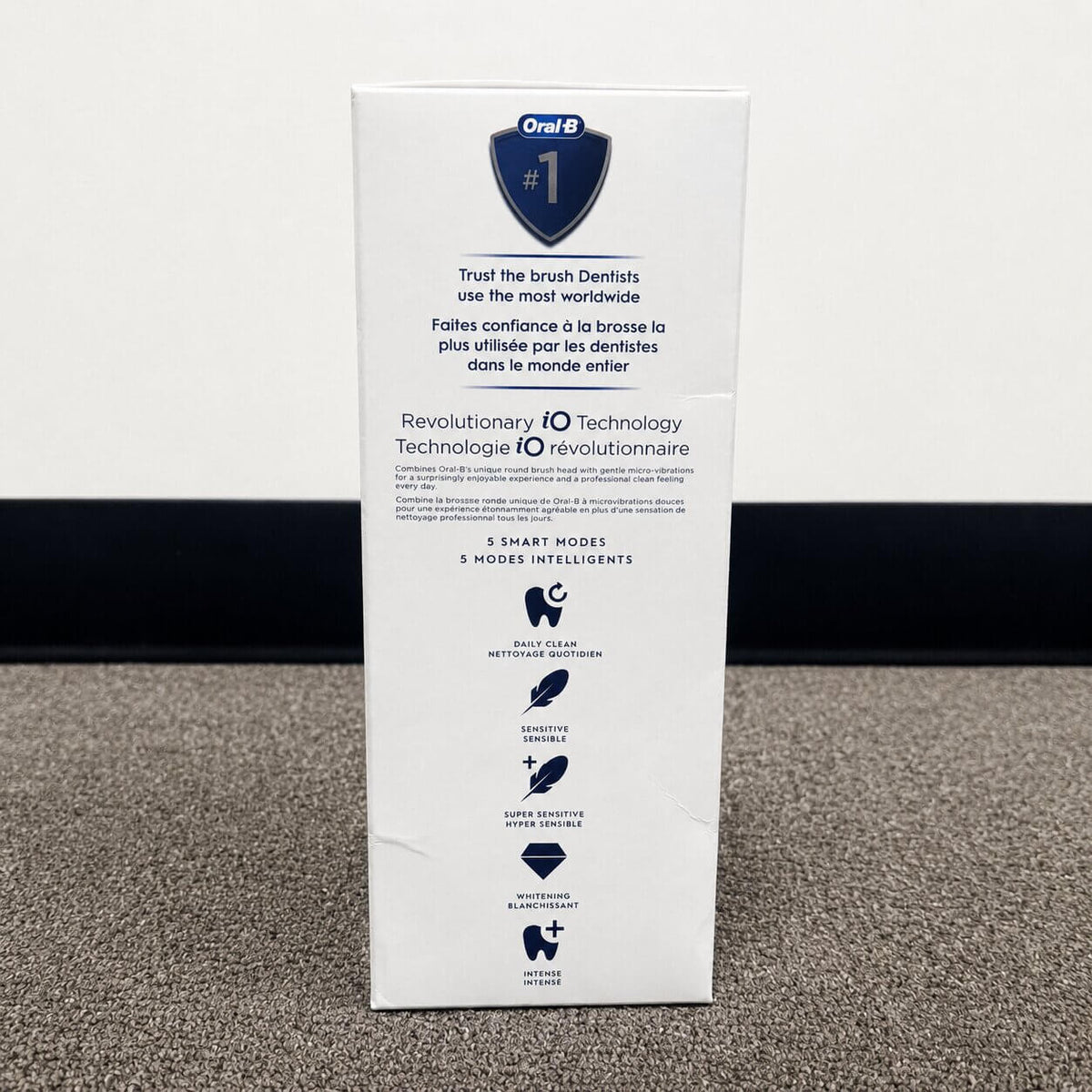 Oral-B iO Series 5 electric toothbrush packaging side showing five smart cleaning modes